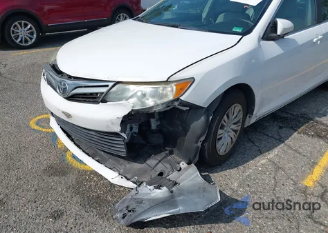 2014 Toyota Camry Le z USA, uszkodzony, nr VIN 4T4BF1FKXER401188